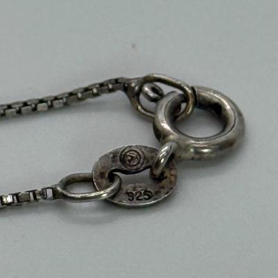 LOT 117: 925 Fine 20” Chain with Cross Pendant 2.4g and 925 Fine Box 24” Chain with Turquoise Cross 4.3 gtw