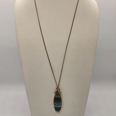 LOT 161jewelry: Gold Filled Cross and Stone Pendants with Odd Lot of Single Earrings, Hat Pin, and Earring Backs
