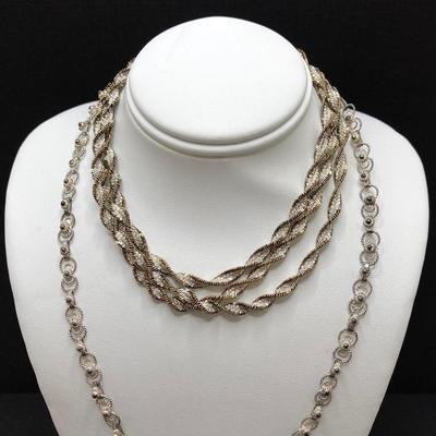 LOT 196: Pair of Sterling Chains - Twisted and Link Styles