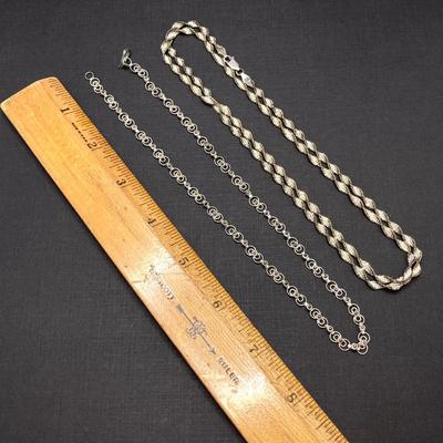 LOT 196: Pair of Sterling Chains - Twisted and Link Styles