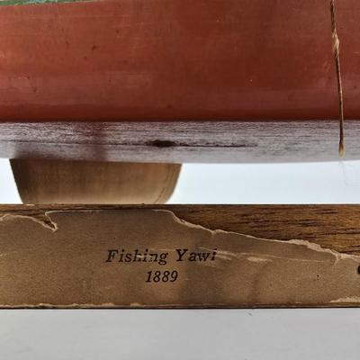 LOT 211: Globe with Two Wood Model Ships