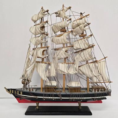 LOT 211: Globe with Two Wood Model Ships