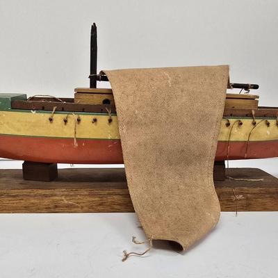 LOT 211: Globe with Two Wood Model Ships