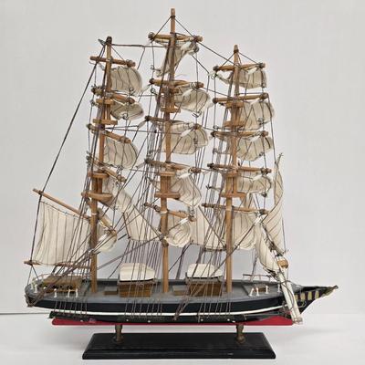 LOT 211: Globe with Two Wood Model Ships