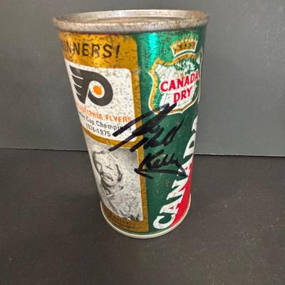 LOT 222: Autographed Canada Dry Philadelphia Flyers Banks, Bob Kelly Photograph & Unopened Can