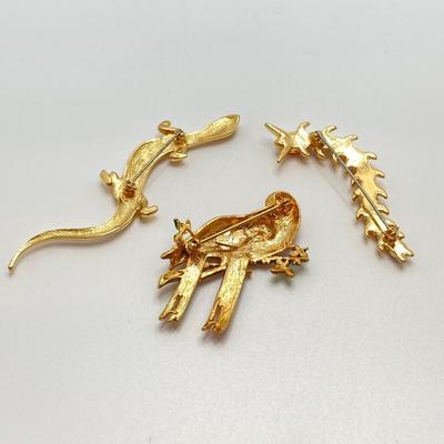 LOT 256: Collection of Colorful and Shiny Brooches and Pins - Coro and More