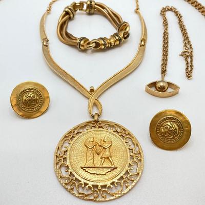LOT 262: Dazzling Gold Tone Egyptian Style Jewelry Collection
