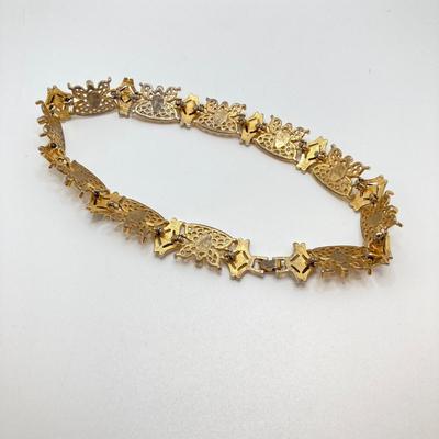 LOT 262: Dazzling Gold Tone Egyptian Style Jewelry Collection