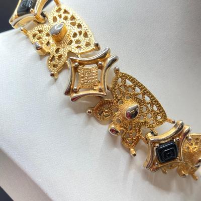 LOT 262: Dazzling Gold Tone Egyptian Style Jewelry Collection
