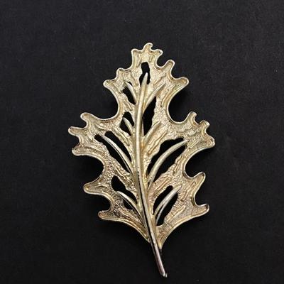 Gold tone leaf brooch