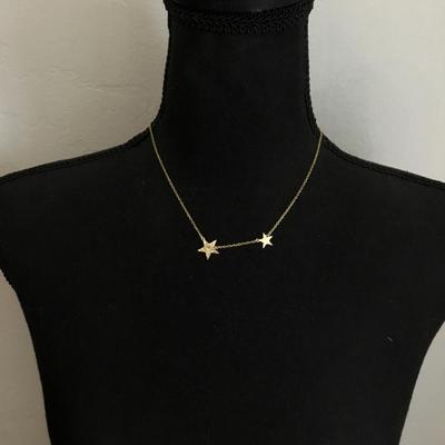 Beautiful gold tone star necklace