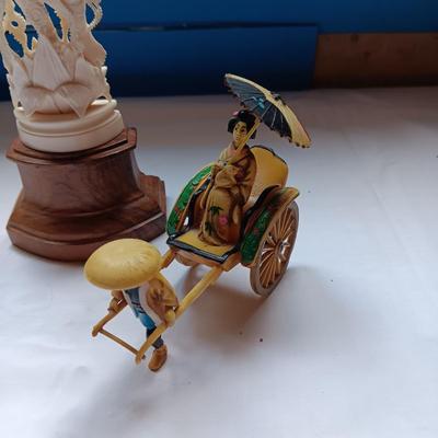 DETAILED, HAND CARVED HINDU GODDESS SARASWATI AND A CELLULOID RICKSHAW
