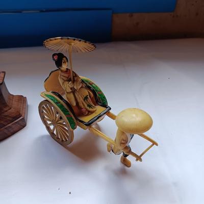 DETAILED, HAND CARVED HINDU GODDESS SARASWATI AND A CELLULOID RICKSHAW