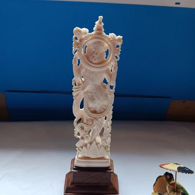 DETAILED, HAND CARVED HINDU GODDESS SARASWATI AND A CELLULOID RICKSHAW