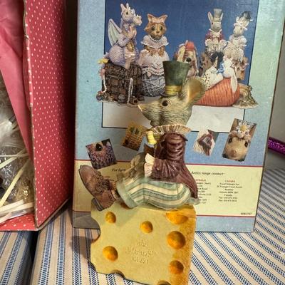 This is a Paradise Galleries porcelain Native American doll and other items.