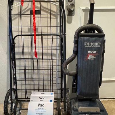 Folding shopping or utility cart. Hoover vacuum cleaner.