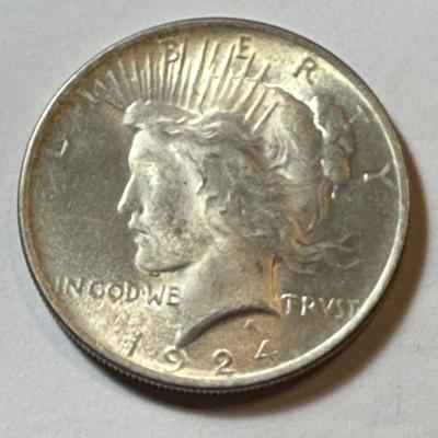 1924-P UNCIRCULATED CONDITION TONED PEACE SILVER DOLLAR COIN #3 AS PICTURED.