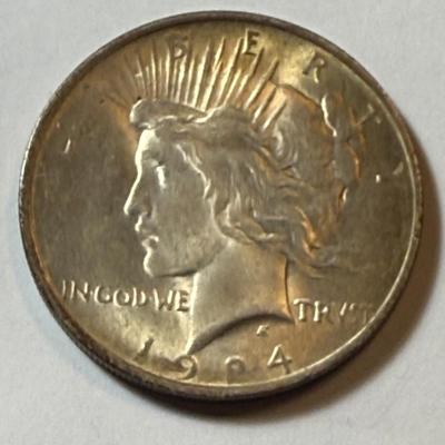 1924-P UNCIRCULATED CONDITION TONED PEACE SILVER DOLLAR COIN #4 AS PICTURED.