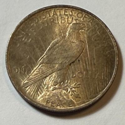 1924-P UNCIRCULATED CONDITION TONED PEACE SILVER DOLLAR COIN #4 AS PICTURED.