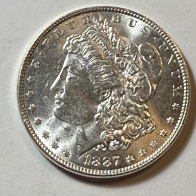 1887-P UNCIRCULATED CONDITION MORGAN SILVER DOLLAR COIN #6 AS PICTURED.