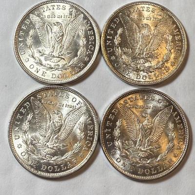 (4) 1921-P UNCIRCULATED CONDITION MORGAN SILVER DOLLARS AS PICTURED.