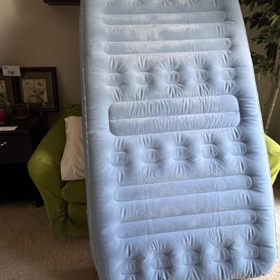 Futon, Blow up mattress And pillows.