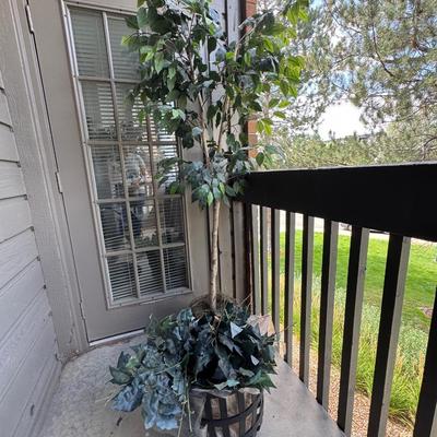 Artificial Ficus tree, a popular decorative plant for both indoor and outdoor spaces.