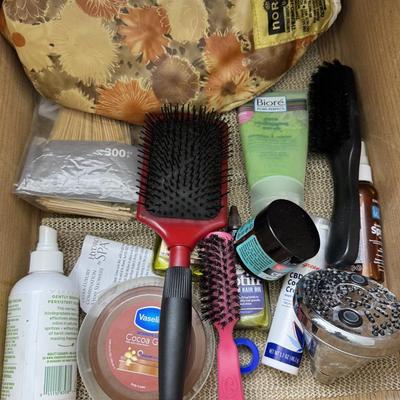 Variety of personal care and beauty items, primarily focused on hair and skin care.