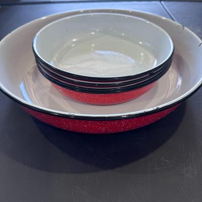 Set of red speckled enamelware bowls