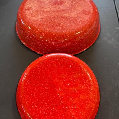 Set of red speckled enamelware bowls