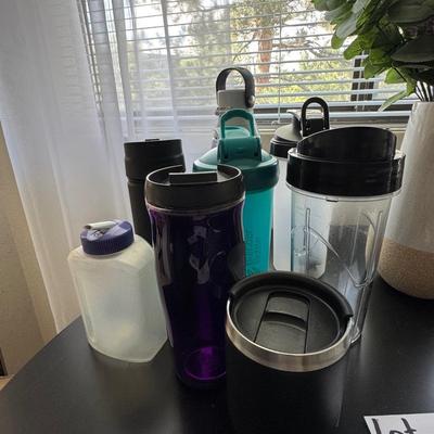 "lot," of various water bottles and tumblers.