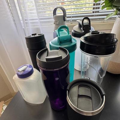 "lot," of various water bottles and tumblers.