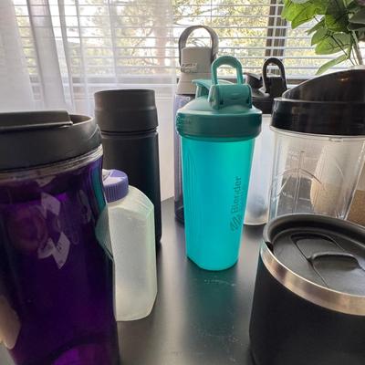 "lot," of various water bottles and tumblers.