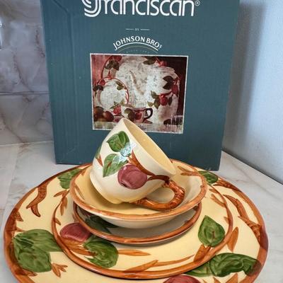 Franciscan Apple dinnerware collection, which is a popular earthenware pattern introduced in 1940.
