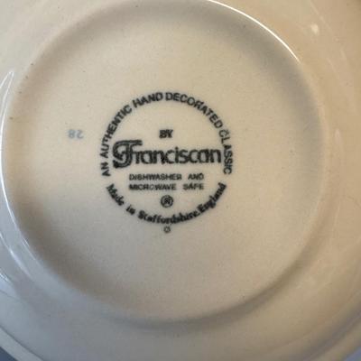 Franciscan Apple dinnerware collection, which is a popular earthenware pattern introduced in 1940.
