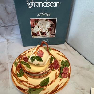 Franciscan Apple dinnerware collection, which is a popular earthenware pattern introduced in 1940.