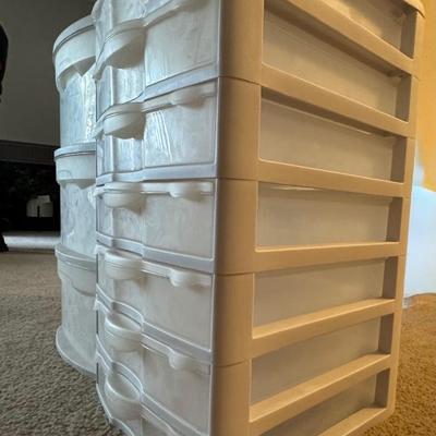 Two Sterilite storage units: a 3-drawer cart and a 7-drawer organizer.