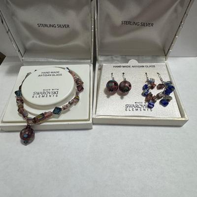 "STERLING SILVER" and "HAND MADE ARTISAN GLASS"