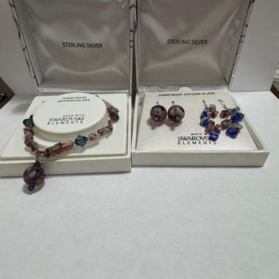 "STERLING SILVER" and "HAND MADE ARTISAN GLASS"