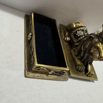 Vintage Borghese Recumbent Lion box and collection of lapel pins.