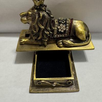 Vintage Borghese Recumbent Lion box and collection of lapel pins.