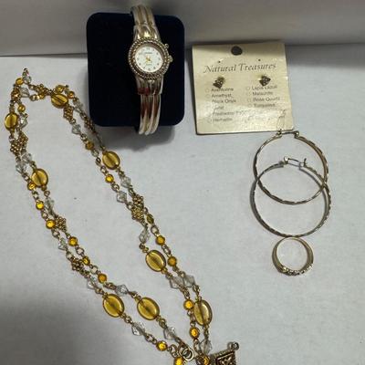 14k gold ring, Gruen ladies watch, Natural Treasure earrings.