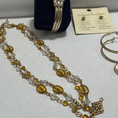 14k gold ring, Gruen ladies watch, Natural Treasure earrings.