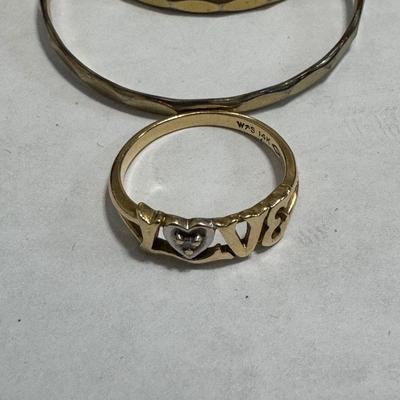 14k gold ring, Gruen ladies watch, Natural Treasure earrings.