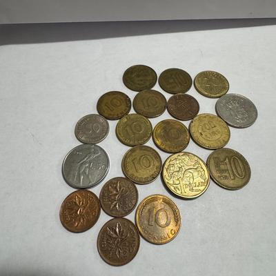 Collection of various foreign coins.