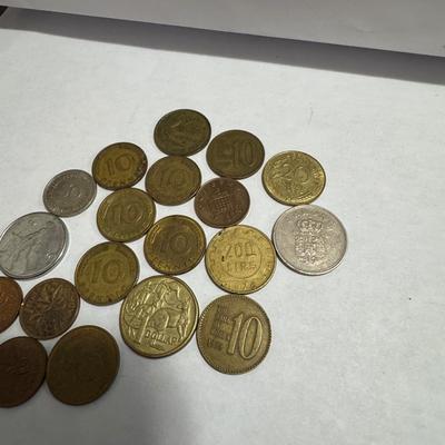 Collection of various foreign coins.