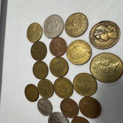 Collection of various foreign coins.