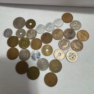 Collection of various foreign coins.