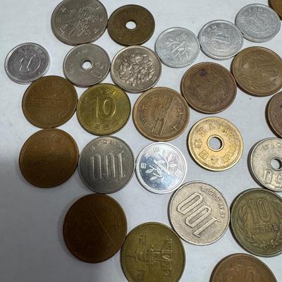 Collection of various foreign coins.