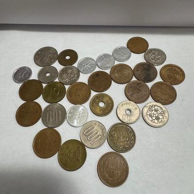 Collection of various foreign coins.